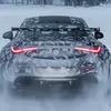Thumbnail image of the Mercedes-Benz coupe in camouflage