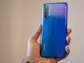 post_big/Realme-XT-in-hand-with-back-panel-and-gradient.jpg