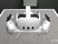 post_big/Meta-Quest-3-Flanked-by-Two-Controllers-On-Gray-Table-840w-472h.jpg.webp