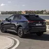Preview: 2026 Toyota bZ4X in motion, side view in deep blue metallic