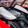 Thumbnail of front view of Porsche Carrera GT in Guards Red
