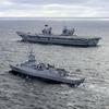 Le porte-avions britannique HMS Queen Elizabeth, qui transporte des chasseurs de cinquième génération F-35B Lightning II, est passé sous le commandement de l'OTAN pour la première fois dans l'histoire.-35