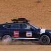 Genesis GV80 Desert Edition с пустынным пейзажем