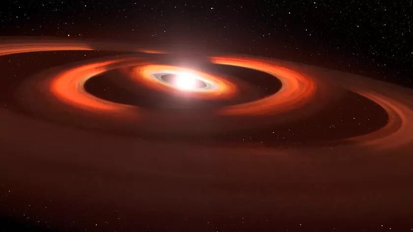 Телескоп Hubble показал зарождение планет в звёздной системе, которая напоминает Солнечную