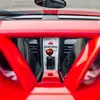 Thumbnail of back view of Porsche Carrera GT in Guards Red