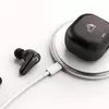 Miniature des écouteurs JVC Spiral Dot Pro dans le boîtier de chargement