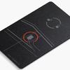 Metal Tesla key card in your hand