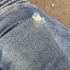 Samsung Galaxy S24 Ultra, torn jeans