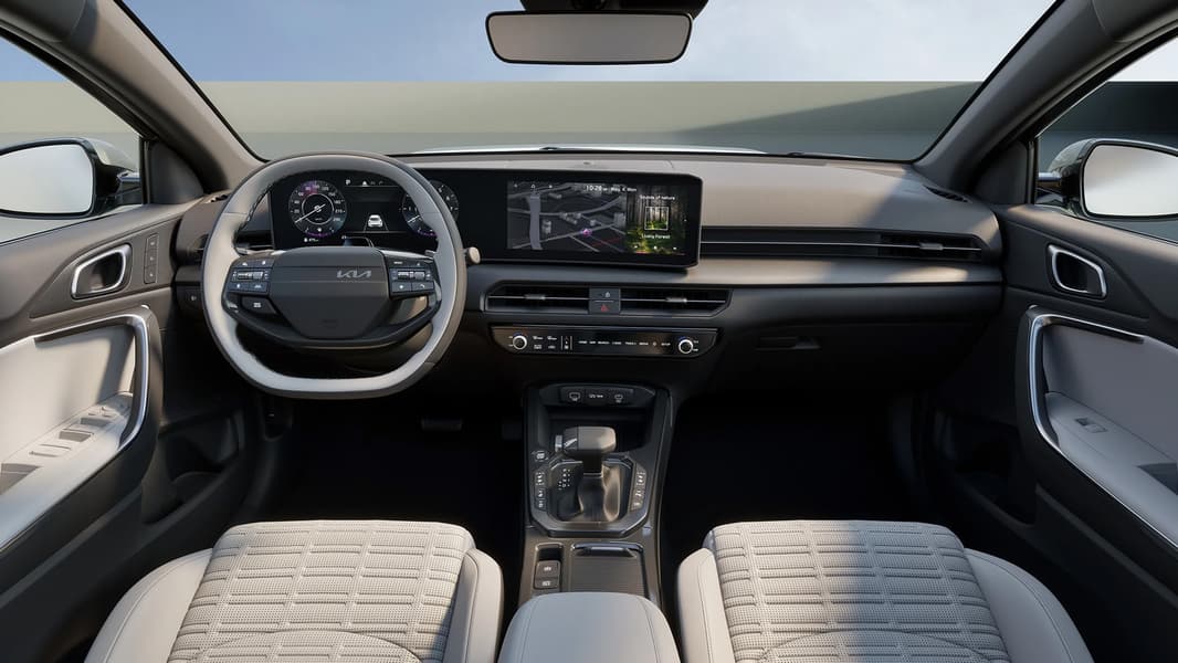 Dual 12.3-inch curved displays and a two-spoke steering wheel borrowed from the EV6. Illustration: Kia