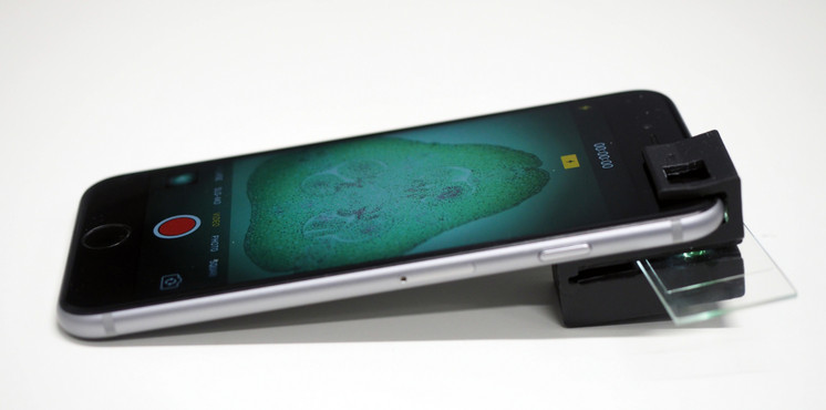 A clip printed on a 3D printer turns a smartphone into a microscope