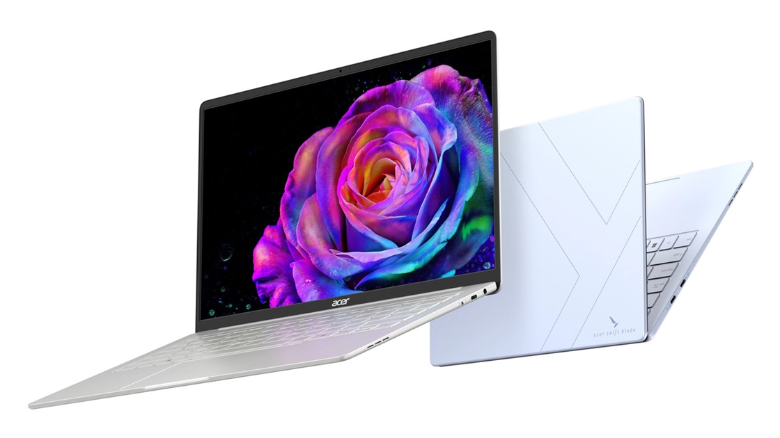 Acer Swift Blade 14 in marshmallow blue — carbon fibre and magnesium-aluminium keep it under 800g.