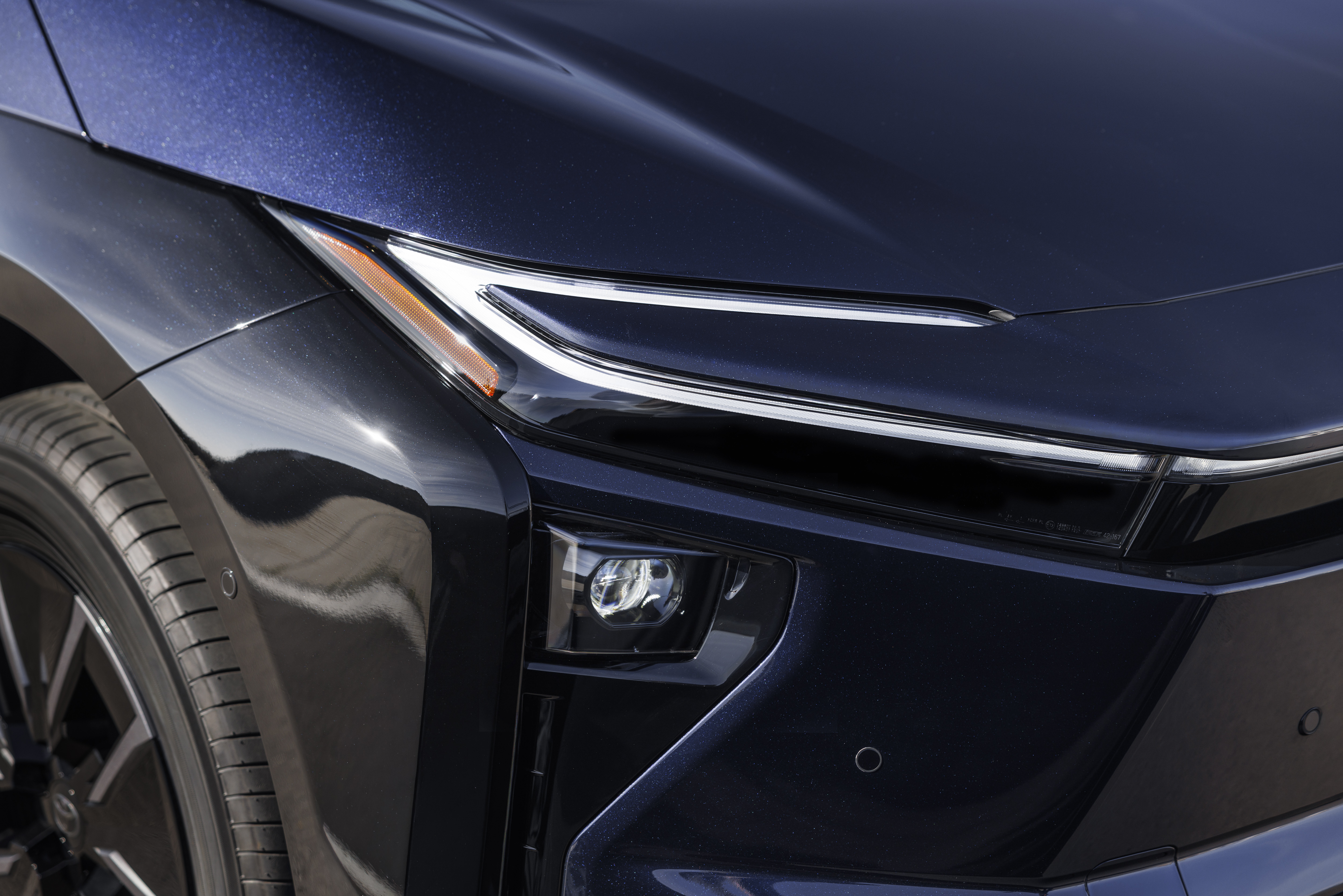 2026 Toyota bZ4X, rear view in deep blue metallic