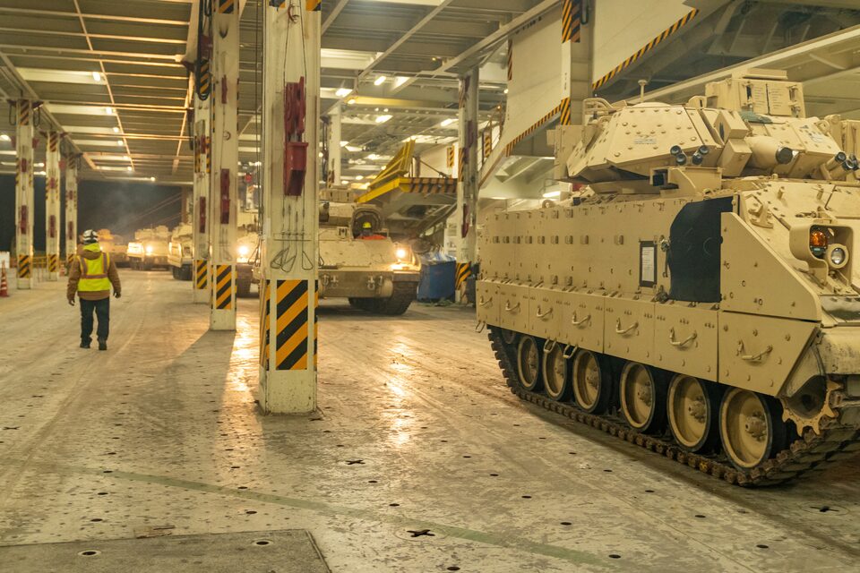 Bradley bound for Ukraine is being loaded onto the ARC Integrity aircraft carrier