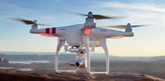 Квадрокоптер DJI Phantom 2 Vision+ с 14-мегапиксельной камерой и 3-осевым стабилизатором изображения
