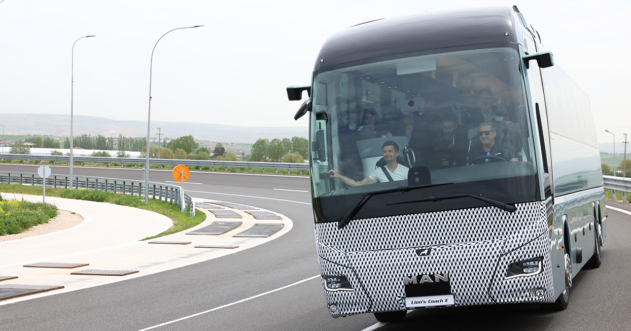 MAN Lion's Coach E electric bus prototype in camouflage colour scheme