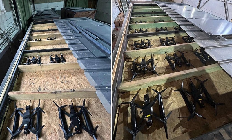 Drones camouflaged in the roof of a car cargo trailer