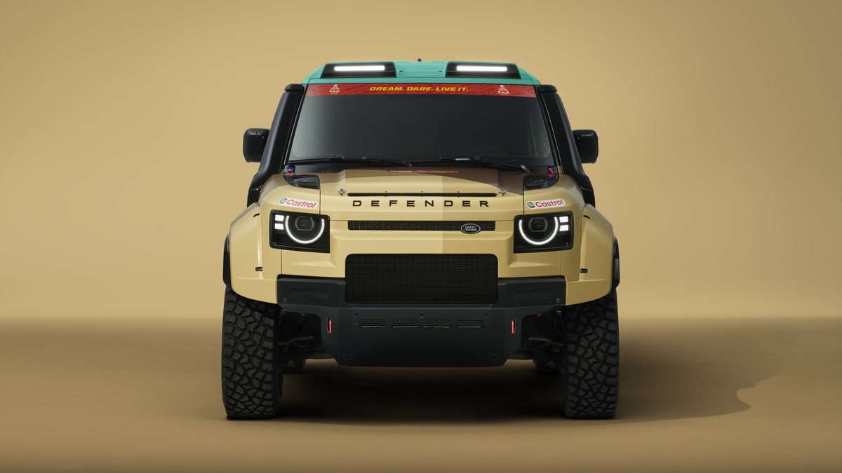 Land Rover Defender among desert landscapes