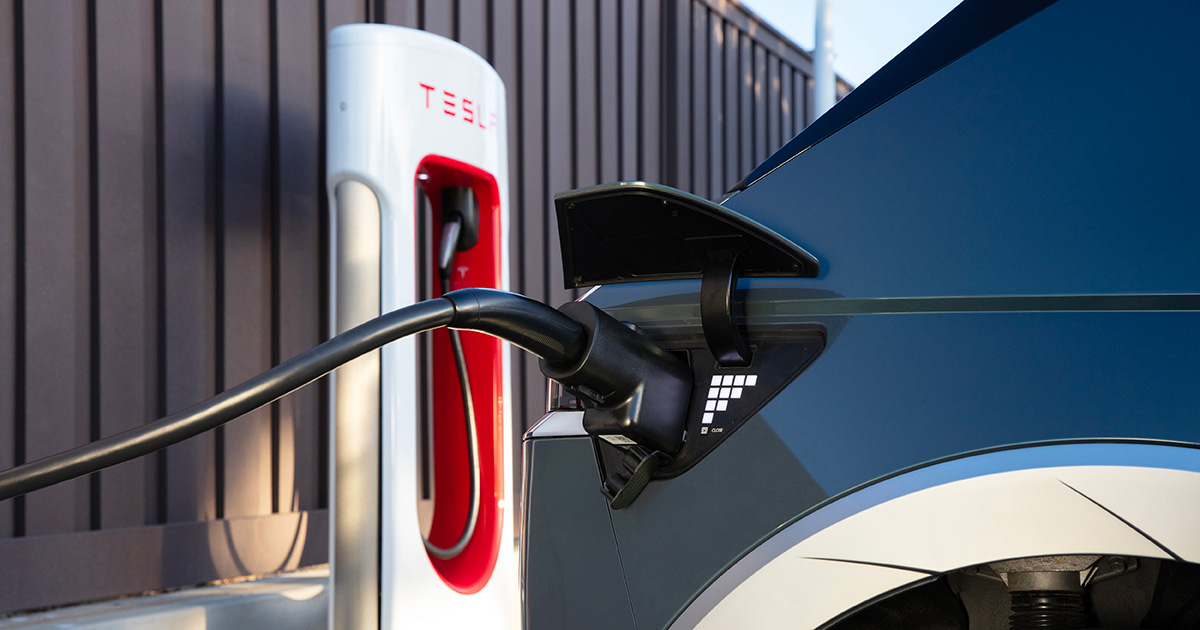 A Hyundai Ioniq 5 Limited 2025 car connected to a Tesla Supercharger station in Bewleton