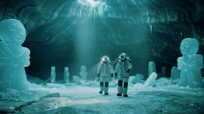 Animation of an ice cave with people in space suits