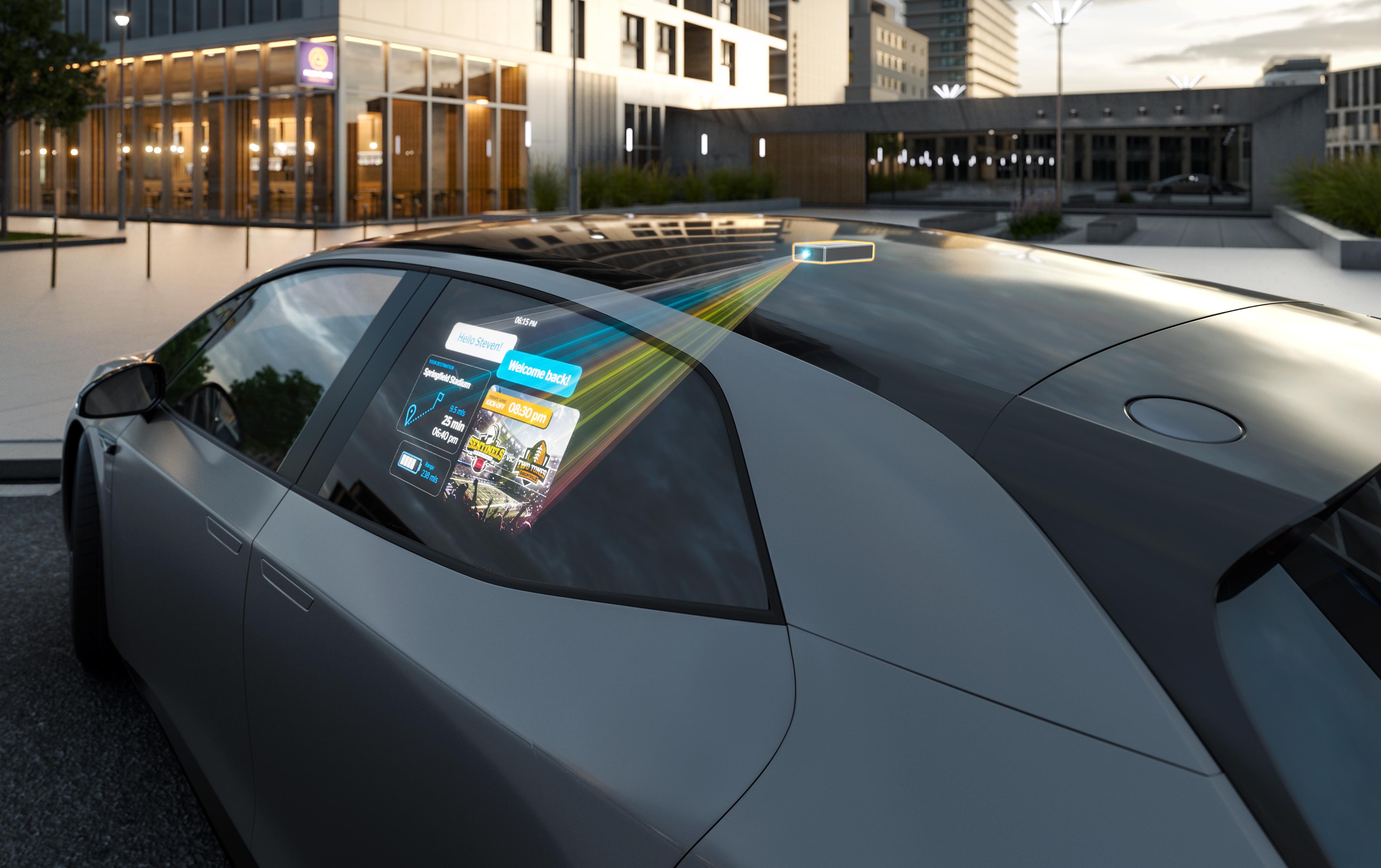 Le mini-projecteur affiche l'image sur la vitre latérale de la voiture