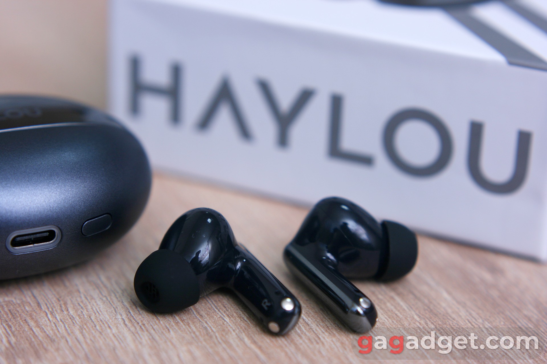 Haylou FlowBuds N55 on the background of the packaging