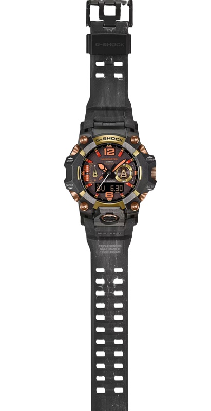 Le bracelet à moulage garal mêle résines de plusieurs teintes pour un effet marbré unique, signe distinctif de ce Mudmaster édition Magma Gold.