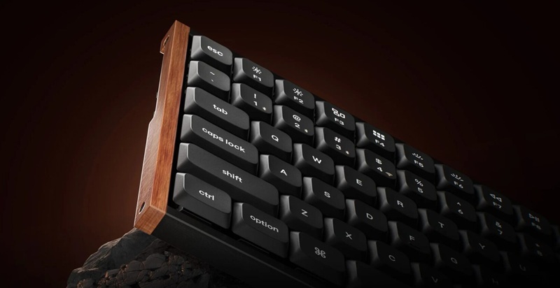 The K5 Ultra 8K features an anodized aluminum top plate, natural wood side accents, and an aluminum rotary knob.