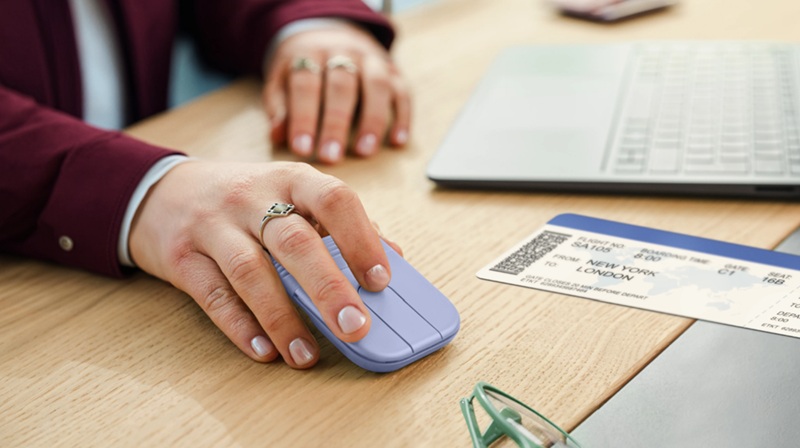 The Logitech Mobi Fold in Lilac — folded to pocket size.