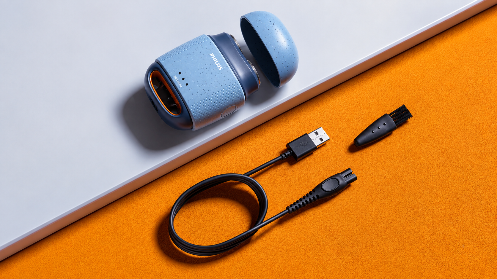 Philips Firefly electric razor with charging cable