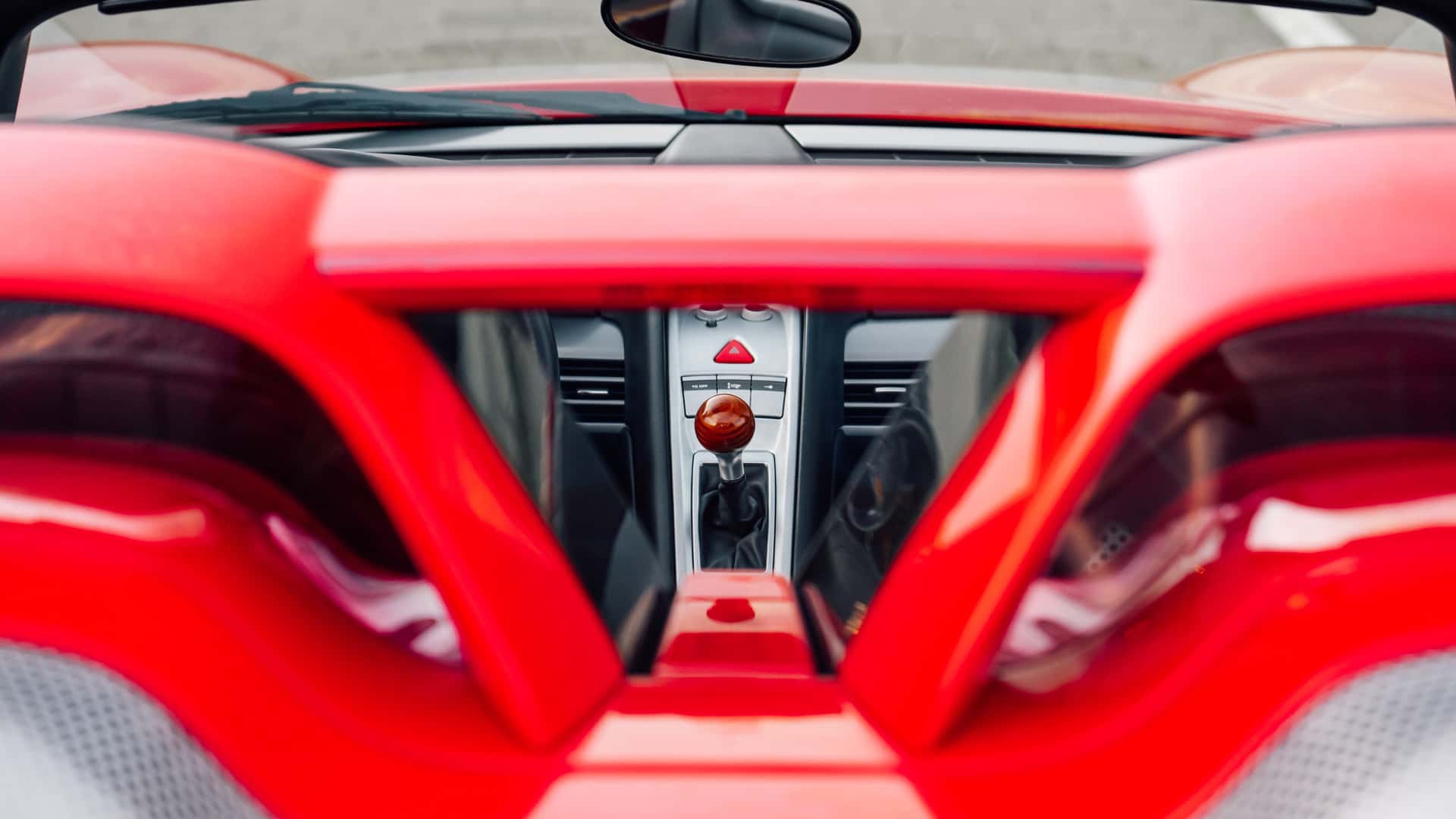 Back view of Porsche Carrera GT in Guards Red