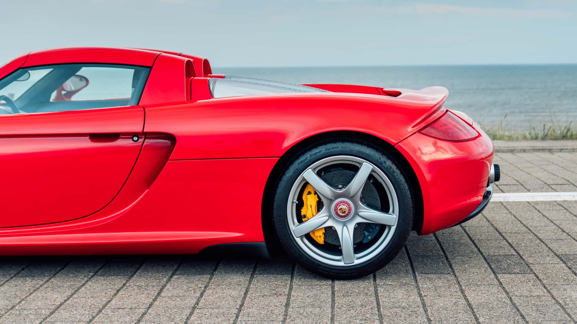 Engine of Porsche Carrera GT in Guards Red