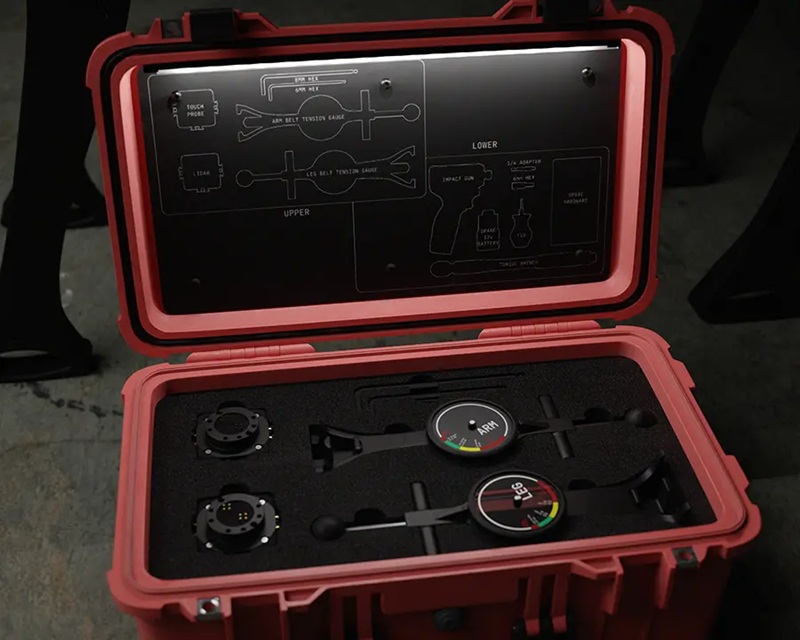 Modular tool attachments — including a chainsaw and drill — can be swapped in the field in minutes.